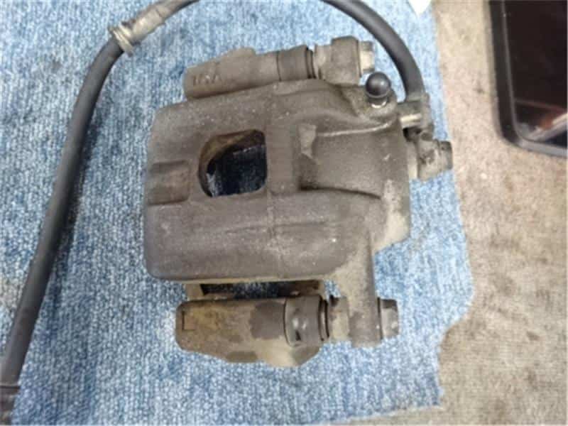 Front Left Brake Caliper MITSUBISHI Pajero Mini 2012 ABA-H58A MR334908 — photo 1