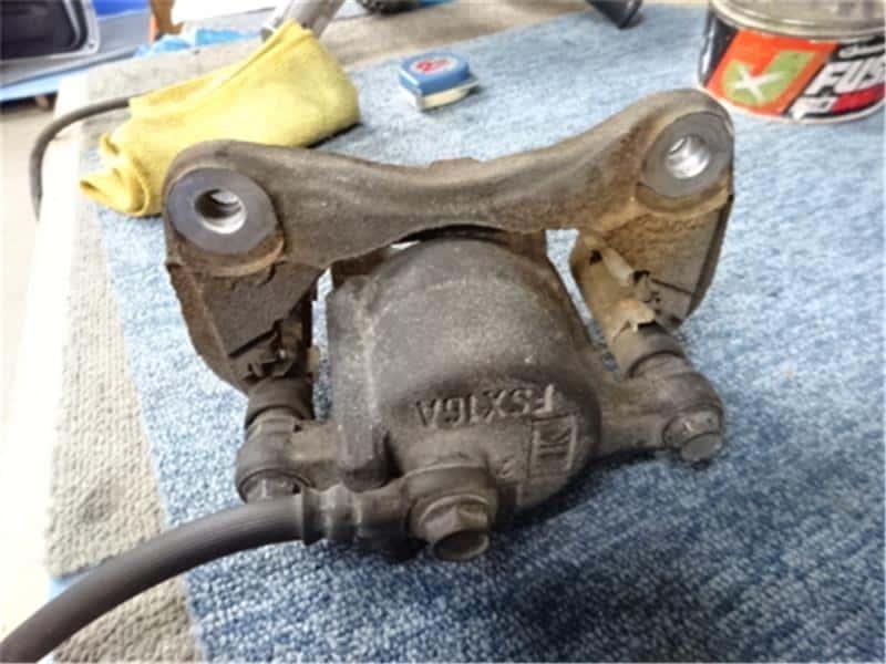 Front Left Brake Caliper MITSUBISHI Pajero Mini 2012 ABA-H58A MR334908 — photo 7