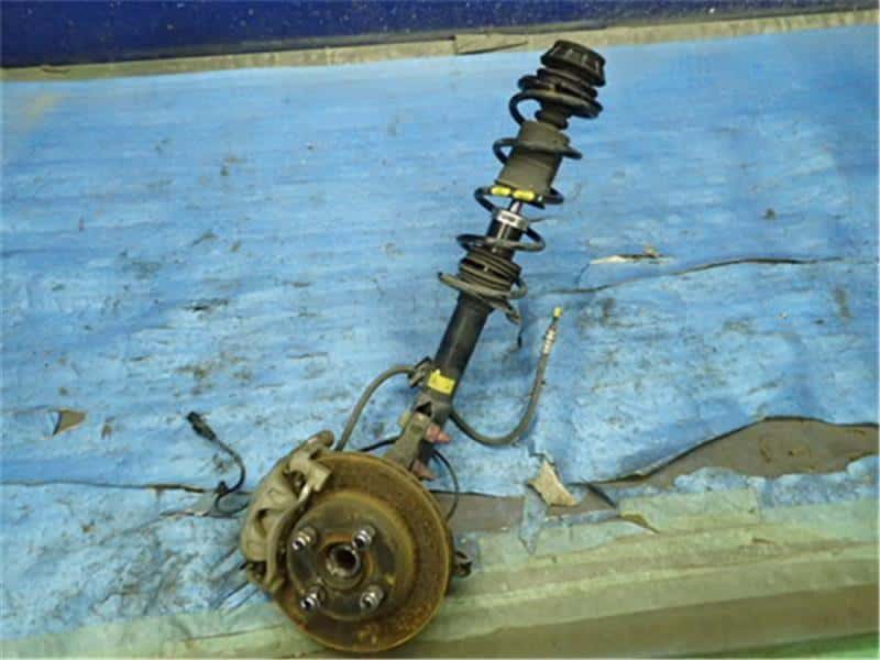 Front Left Strut Assembly NISSAN March 2010 DBA-K13 — photo 1