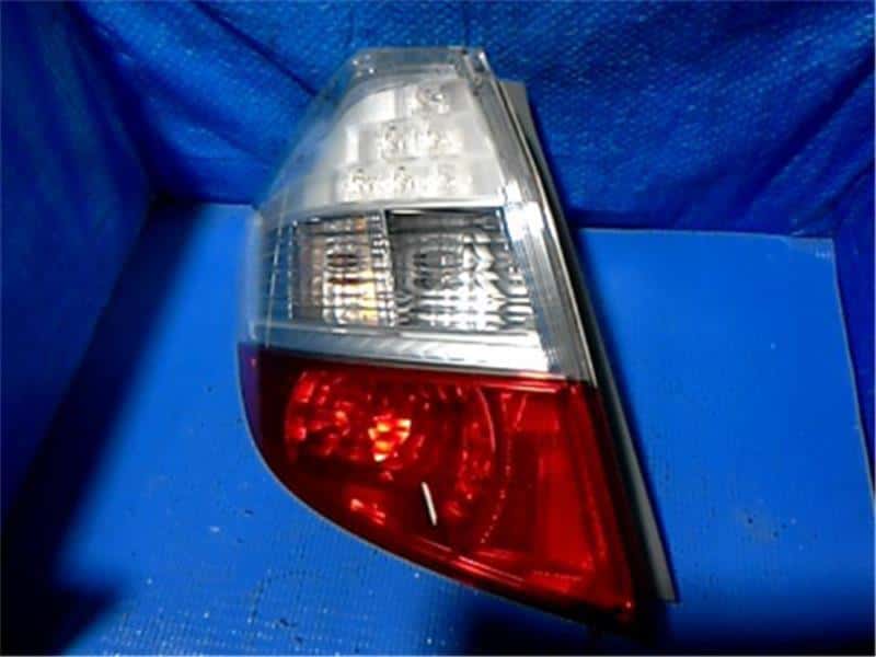 Left Tail Light HONDA Fit 2008 DBA-GE8 33550TF0J01 — photo 1