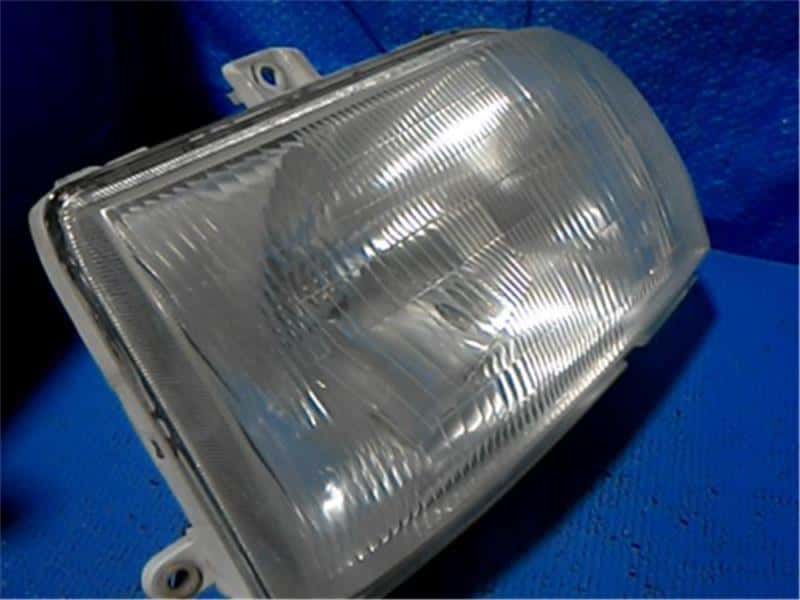 Right Headlight DAIHATSU Move 1997 E-L600S — photo 2
