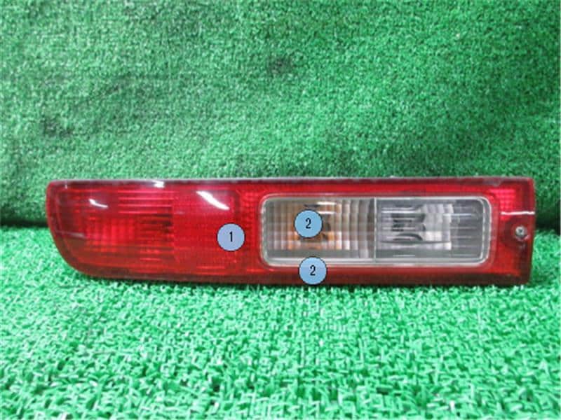 Left Tail Light DAIHATSU Hijet 2008 EBD-S331V — photo 1