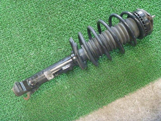Front Right Strut MAZDA Demio 2003 UA-DY3R D57134700A — photo 1