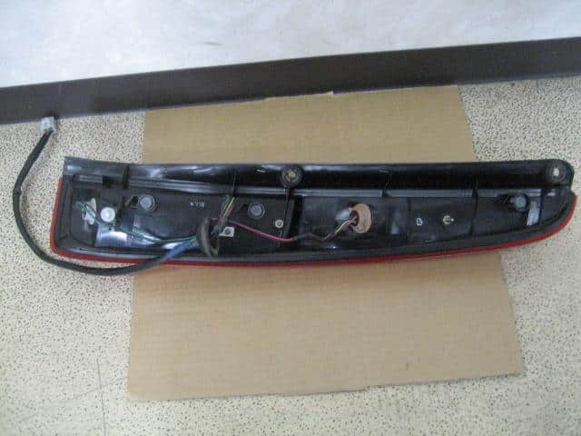 Left Tail Light DAIHATSU Move 2000 GH-L900S — photo 2