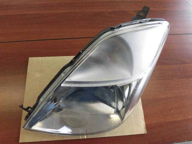 Left Headlight SUZUKI MR Wagon 2004 CBA-MF21S — photo 1