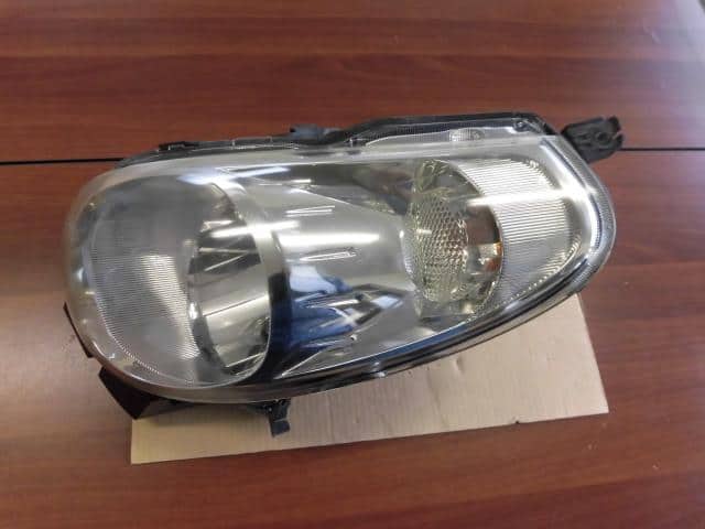 Left Headlight SUBARU R2 2004 CBA-RC1 — photo 1