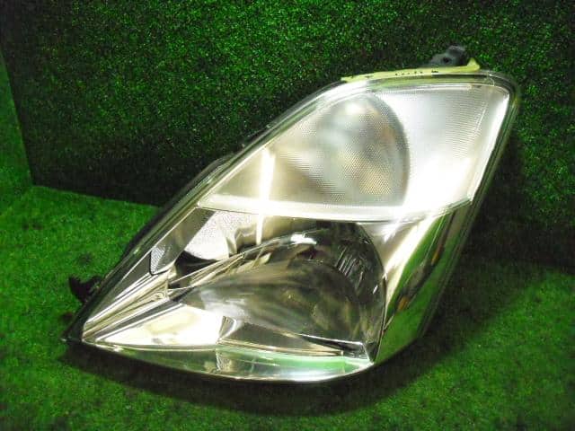 Left Headlight NISSAN Moco 2005 CBA-MG21 — photo 1