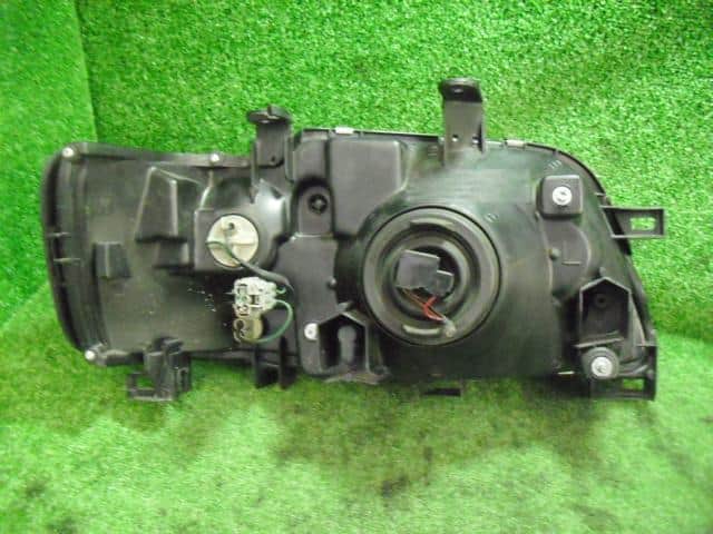 Left Headlight NISSAN Cube 1999 GF-Z10 — photo 2