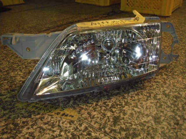 Left Headlight MAZDA Premacy 1999 GF-CP8W — photo 1
