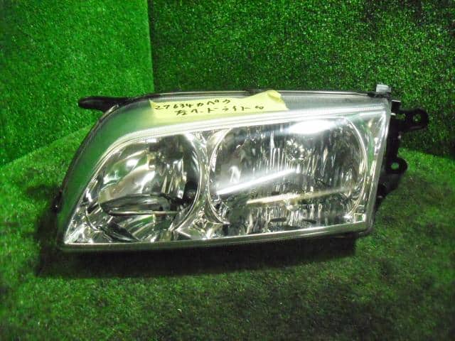 Left Headlight MAZDA Capella 2000 GF-GW8W — photo 1