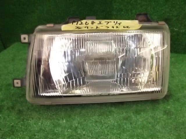 Left Headlight SUZUKI Every 1990 M-DA51V — photo 1