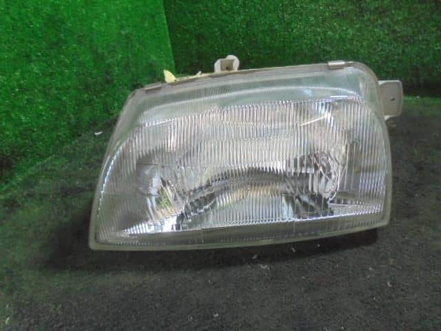 Left Headlight SUZUKI Alto 1995 E-HA11S — photo 1