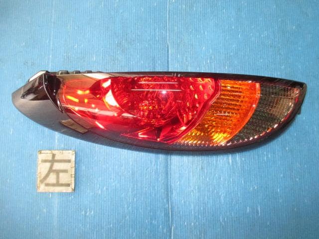 Left Tail Light MITSUBISHI i 2006 CBA-HA1W — photo 1