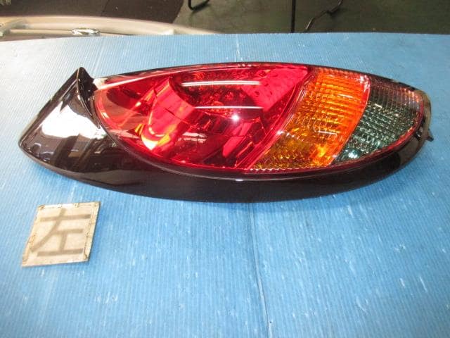 Left Tail Light MITSUBISHI i 2006 CBA-HA1W — photo 2