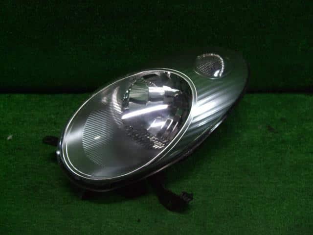 Left Headlight NISSAN March 2002 UA-BNK12 — photo 1