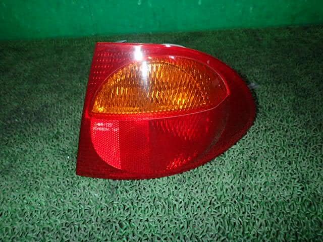 Right Tail Light TOYOTA Caldina 1999 GF-ST210G — photo 1
