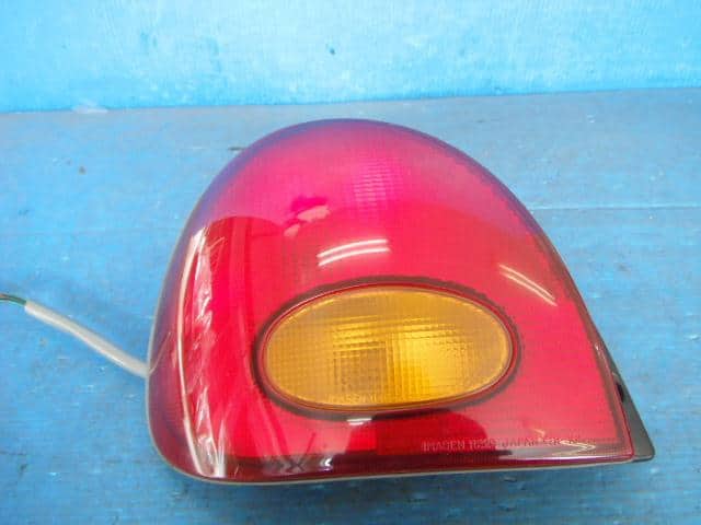 Left Tail Light MITSUBISHI Minica 1994 E-H36A — photo 1