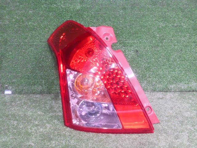 Left Tail Light SUZUKI Swift 2008 DBA-ZD11S 3567073K00 — photo 1
