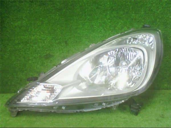 Left Headlight HONDA Fit 2010 DBA-GE7 — photo 1