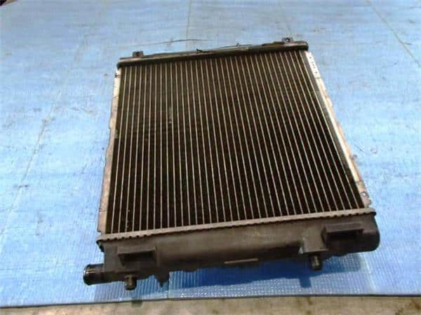 Radiator MAZDA Carol 1999 GF-HB12S 1A0915200 — photo 2