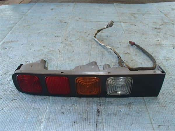 Left Tail Light NISSAN Cube 2003 UA-BZ11 — photo 1