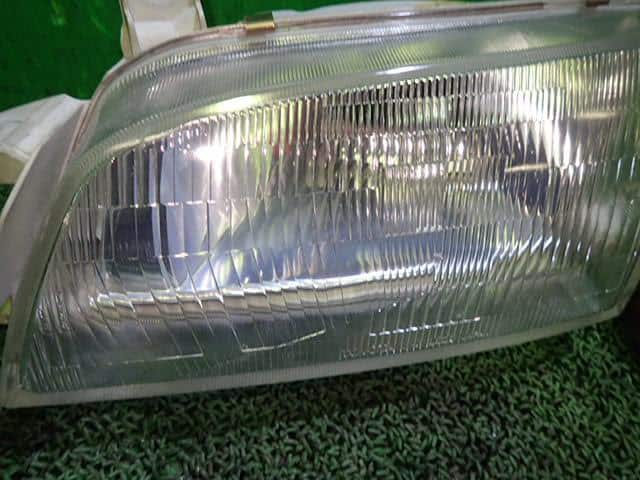 Left Headlight TOYOTA Caldina 1996 E-AT191G 8115021040 — photo 2