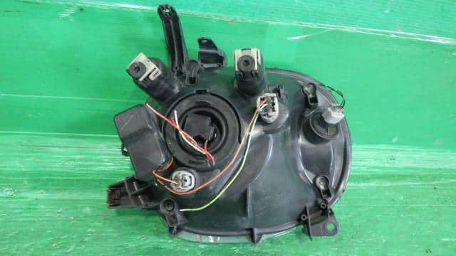 Left Headlight SUZUKI Lapin 2009 DBA-HE22S — photo 3