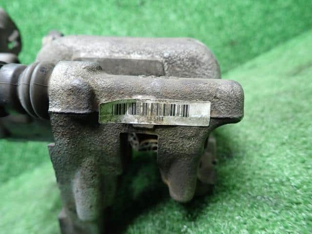 Rear Left Caliper VOLKSWAGEN Golf Variant 2010 DBA-1KCAV — photo 4