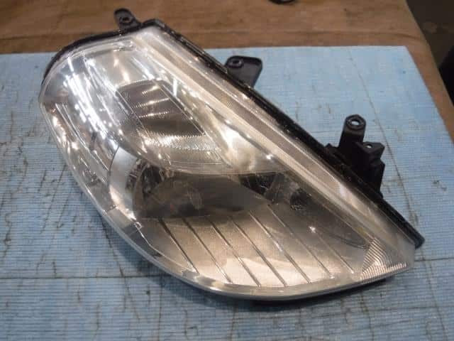 Right Headlight NISSAN Tiida 2010 DBA-NC11 — photo 1