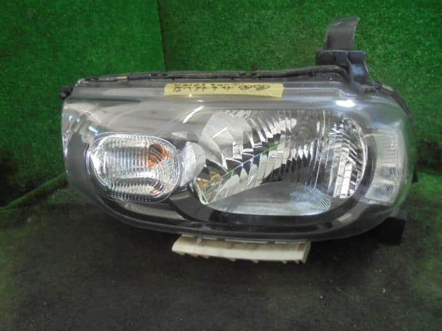 Left Headlight NISSAN Cube 2011 DBA-Z12 — photo 1