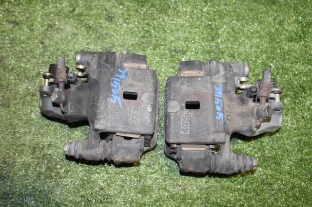 Rear Left Caliper MITSUBISHI COLT PLUS 2004 DBA-Z23W — photo 1