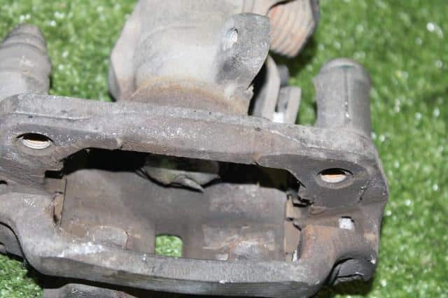 Rear Left Caliper MITSUBISHI COLT PLUS 2004 DBA-Z23W — photo 2