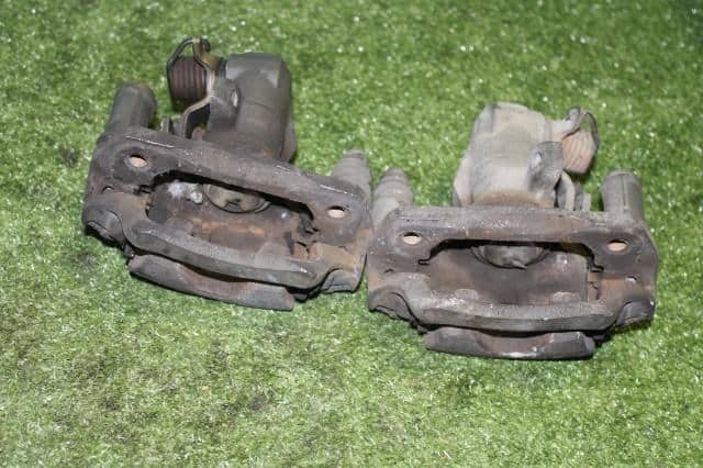 Rear Left Caliper MITSUBISHI COLT PLUS 2004 DBA-Z23W — photo 4