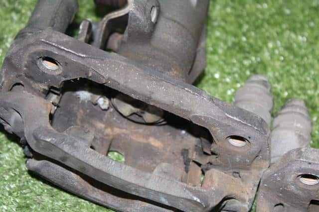 Rear Left Caliper MITSUBISHI COLT PLUS 2004 DBA-Z23W — photo 3