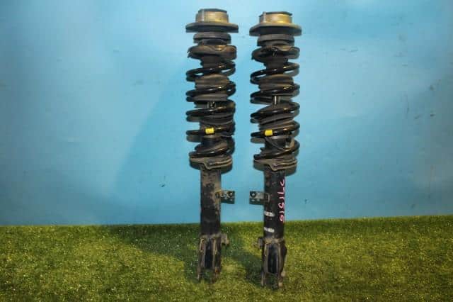 Front Left Strut DAIHATSU Mira 2002 LA-L260S 48520B2110000 — photo 1