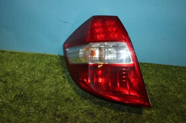 Left Tail Light HONDA Fit 2010 DBA-GE8 — photo 1