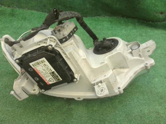 Left Headlight DAIHATSU Tanto 2009 DBA-L375S — photo 5