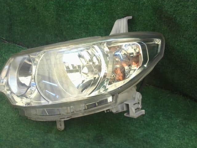 Left Headlight DAIHATSU Tanto 2009 DBA-L375S — photo 2