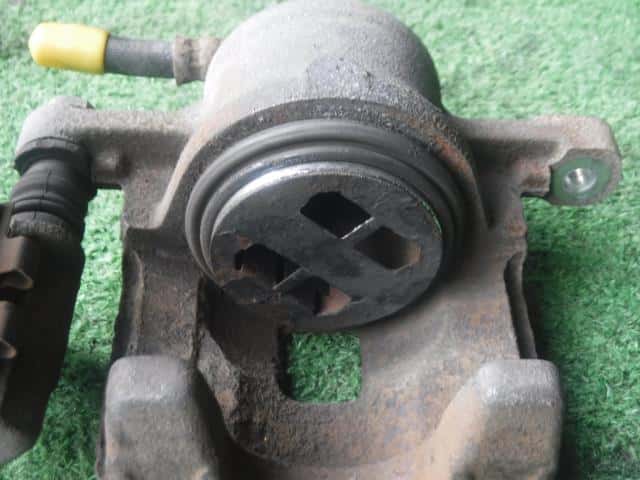 Front Left Caliper NISSAN Moco 2015 DBA-MG33 — photo 6