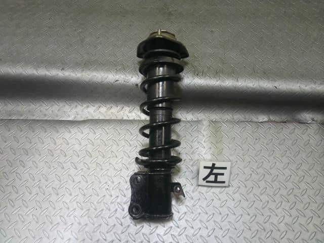 Front Left Strut DAIHATSU Hijet 1996 V-S110P 4852087549000 — photo 1