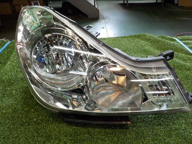 Right Headlight NISSAN Wingroad 2009 DBA-NY12 — photo 1