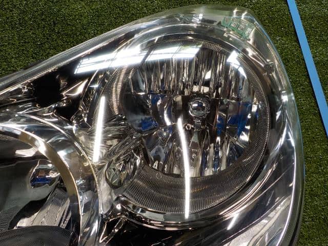 Left Headlight NISSAN Wingroad 2009 DBA-NY12 — photo 6