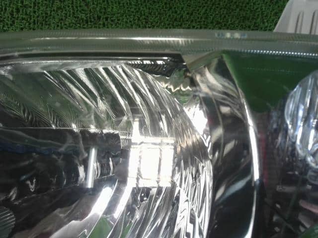 Left Headlight DAIHATSU Tanto 2011 DBA-L385S — photo 2