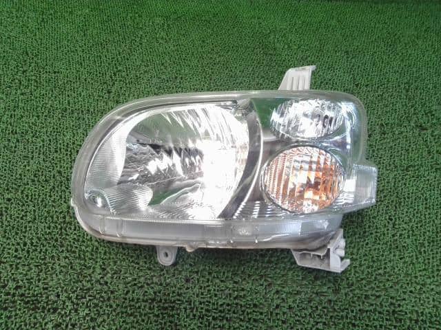 Left Headlight DAIHATSU Tanto 2011 DBA-L385S — photo 1