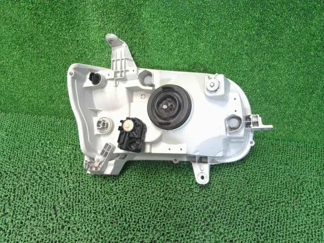 Left Headlight DAIHATSU Tanto 2011 DBA-L385S — photo 4