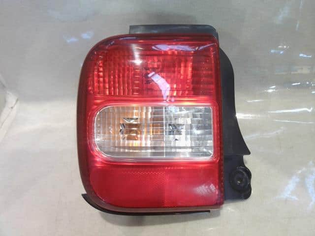 Left Tail Light SUZUKI Lapin 2006 CBA-HE21S 3567075H02 — photo 1