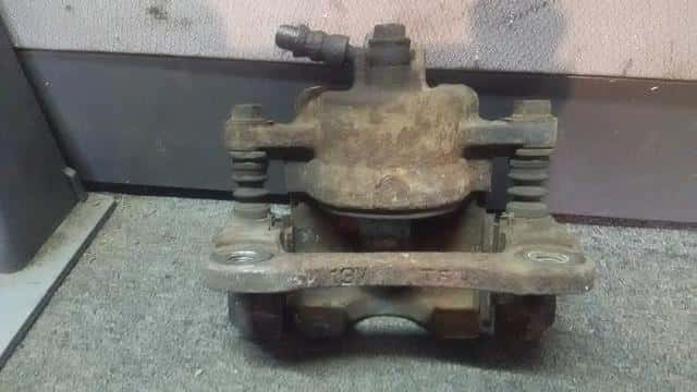 Front Left Caliper SUBARU Stella 2006 DBA-RN2 — photo 2