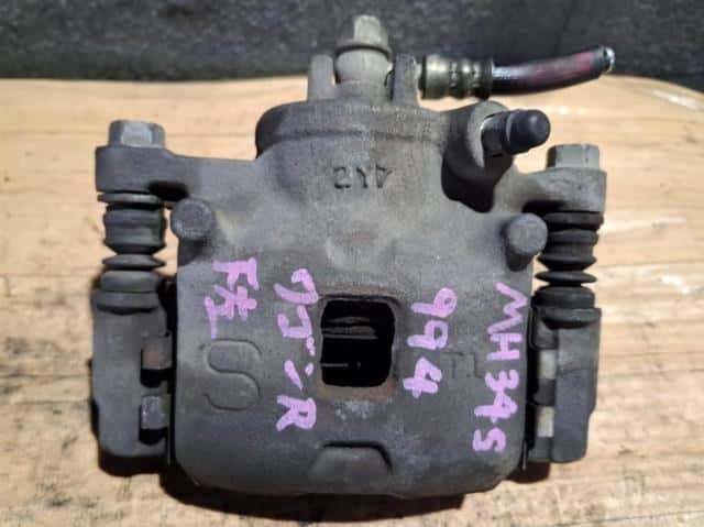 Front Left Caliper SUZUKI Wagon R 2012 DBA-MH34S 5510272M00999 — photo 1