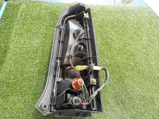 Left Tail Light SUZUKI Wagon R 1998 GF-MC21S 3567076F00 — photo 2