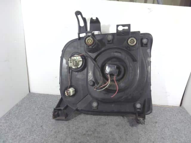Left Headlight SUZUKI Lapin 2005 CBA-HE21S 3532075H02 — photo 2
